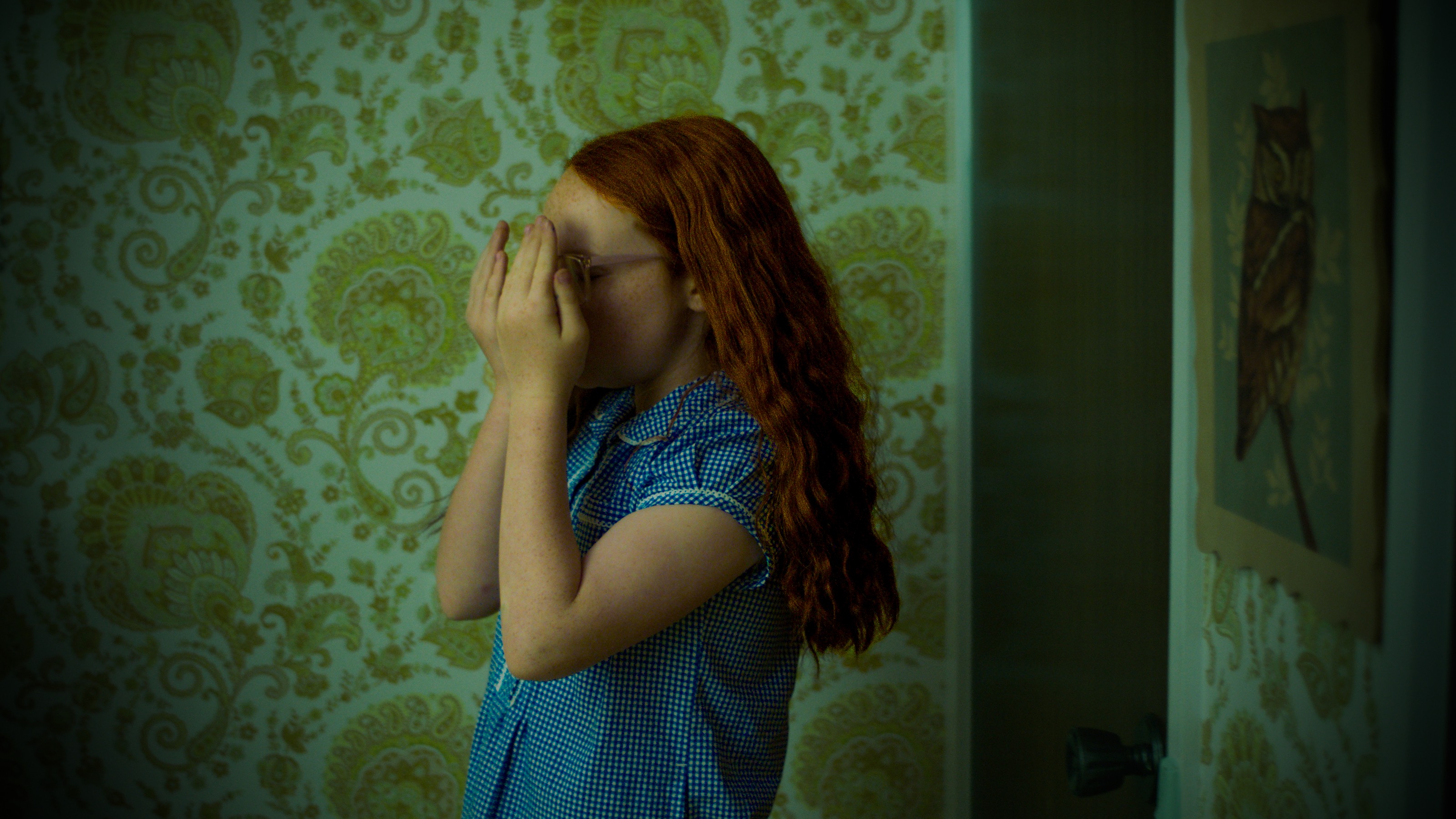 Still from The Room At The End Of The Hallway showing a dimly lit hallway.